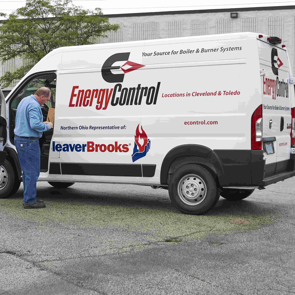 Energy Control technician performing boiler service and repair