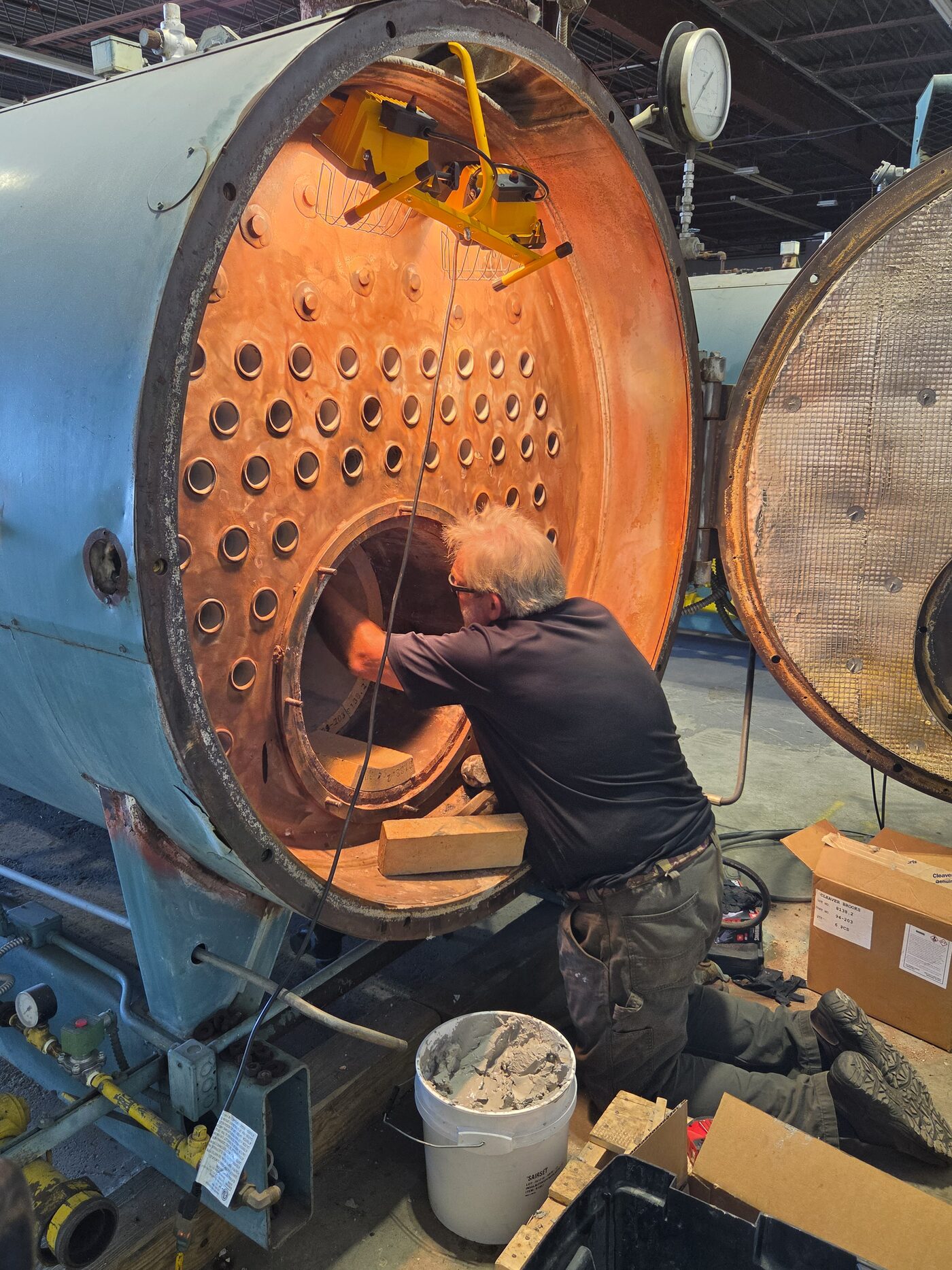 Energy Control technician performing boiler preventative maintenance