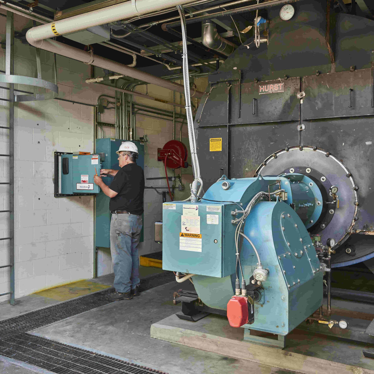 Energy Control technician working on a boiler upgrade and conversion